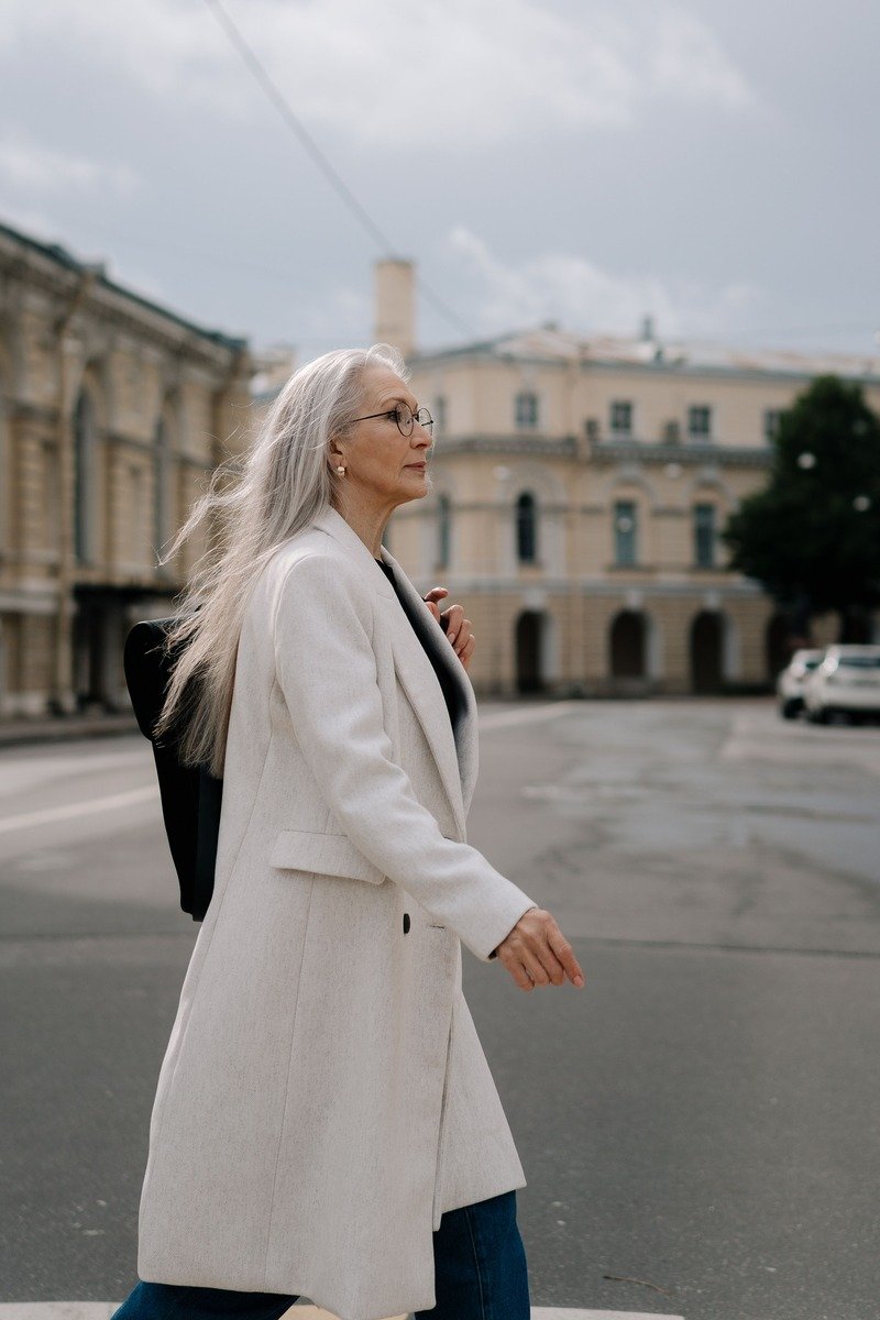 Woman over 50 with sleek straight long hair