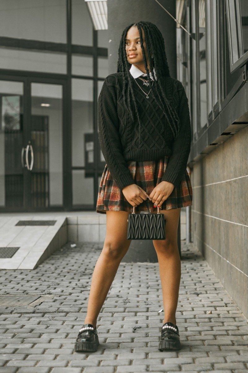Plaid skirt with a crew neck sweater