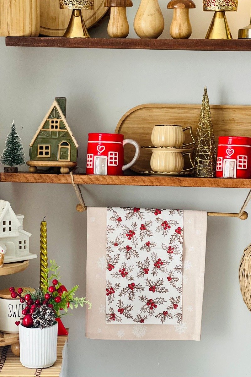 Christmas village display on open wall shelves