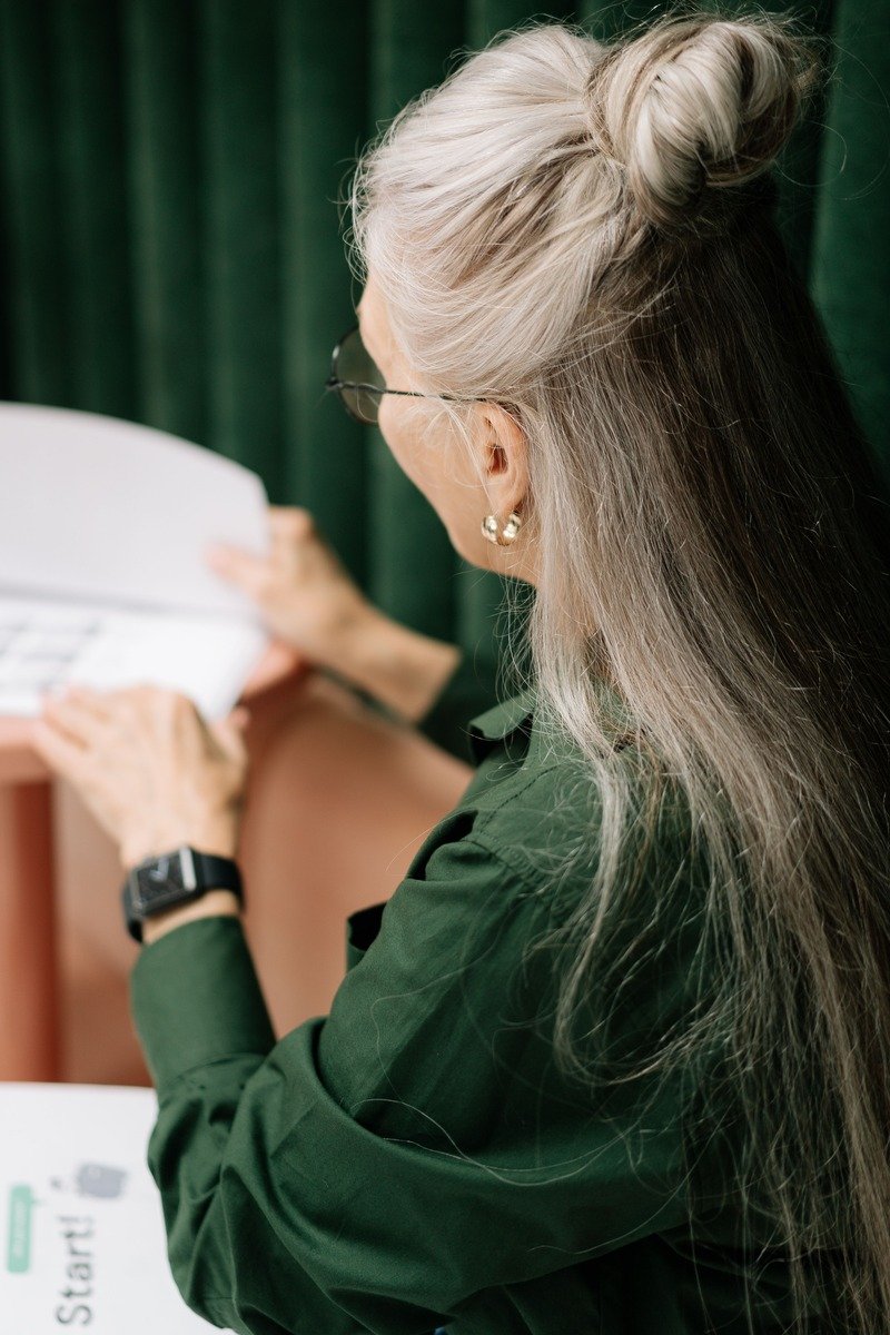 Woman over 50 with a half up hairstyle