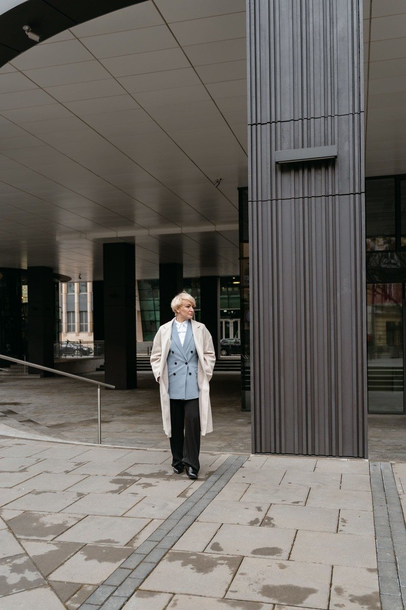Long wool coat over a suit