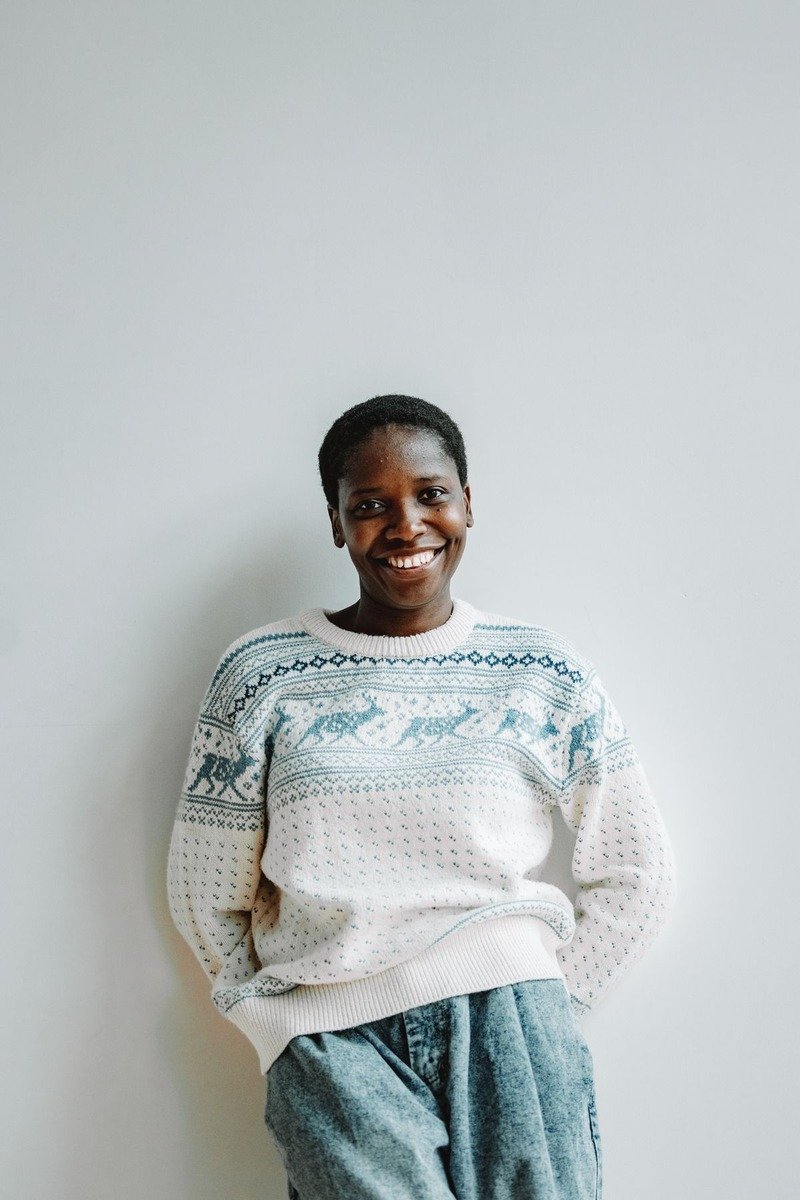 Woman in a Fair Isle sweater and jeans on a cold December day