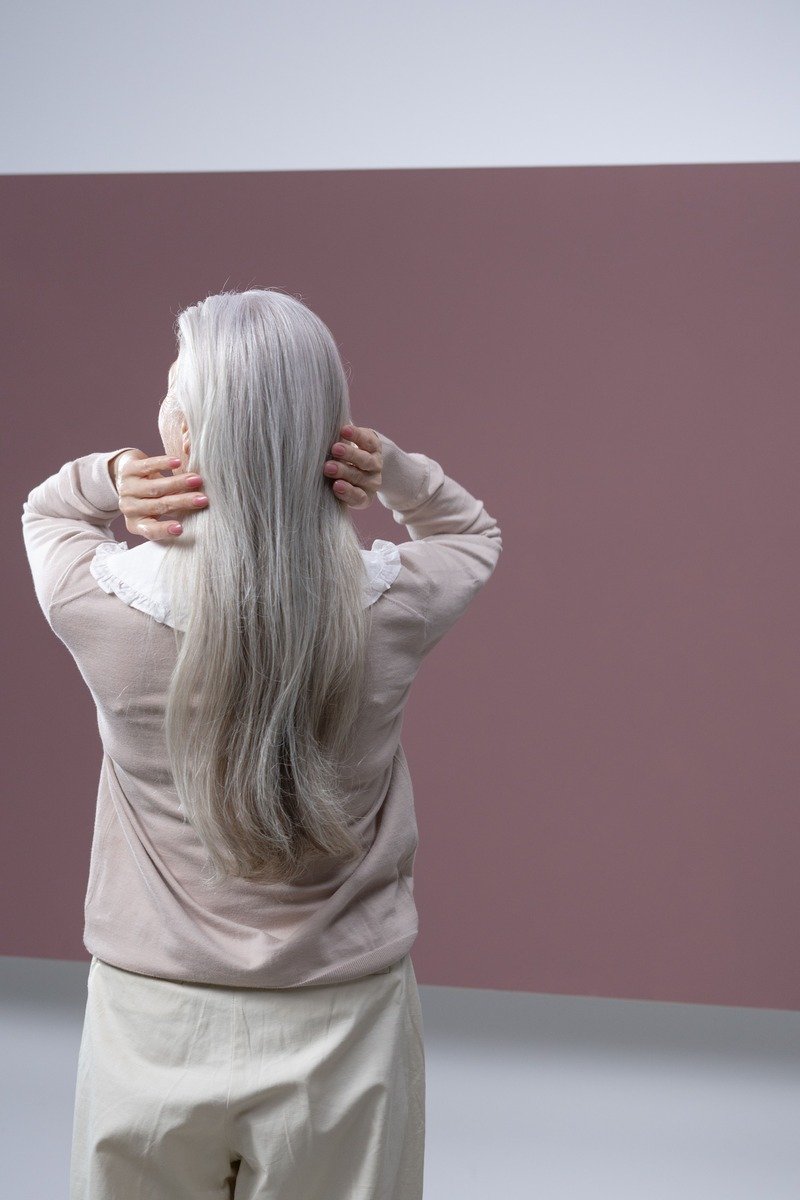 Silver grey winter hair color on a confident woman