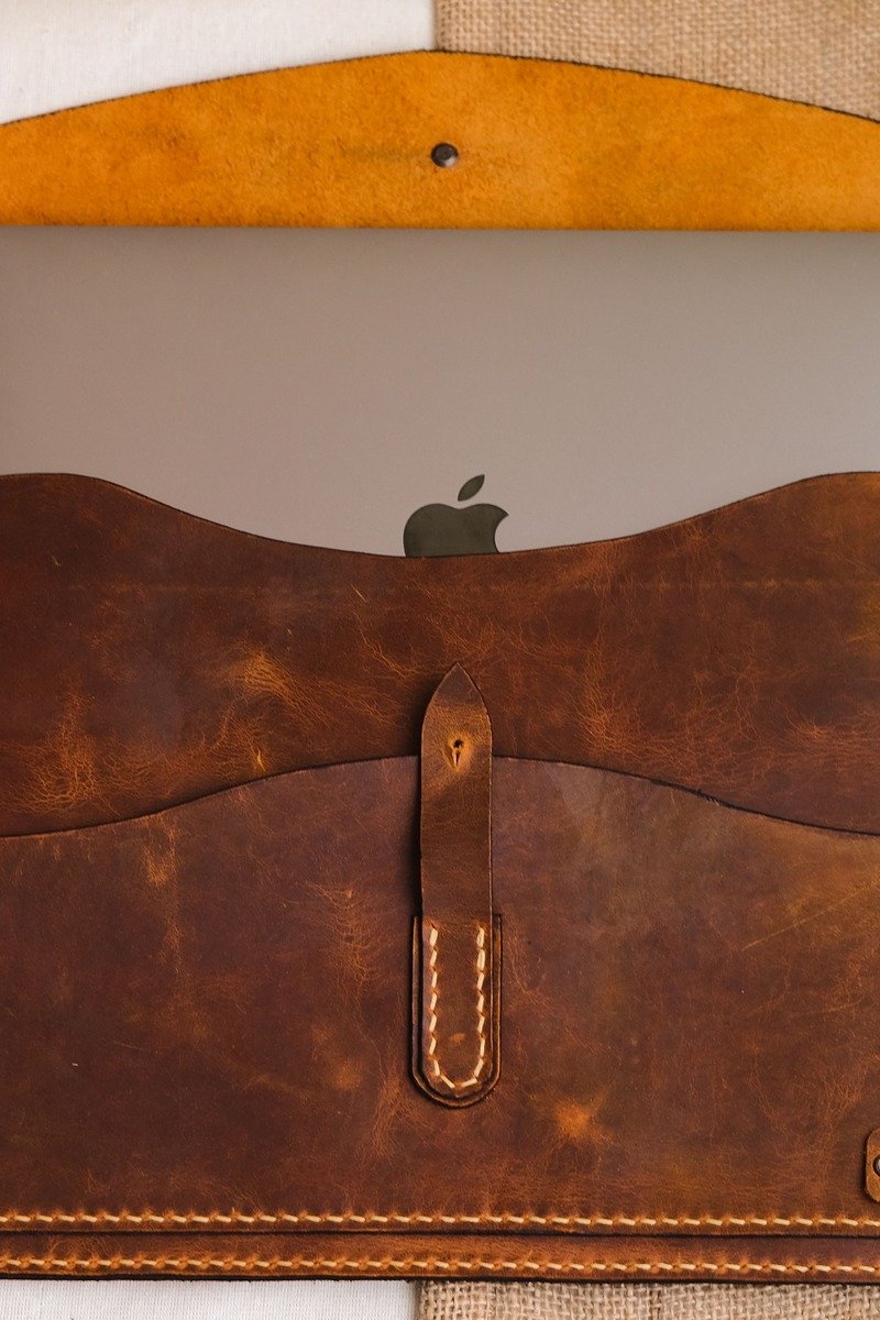 Laptop in a leather sleeve