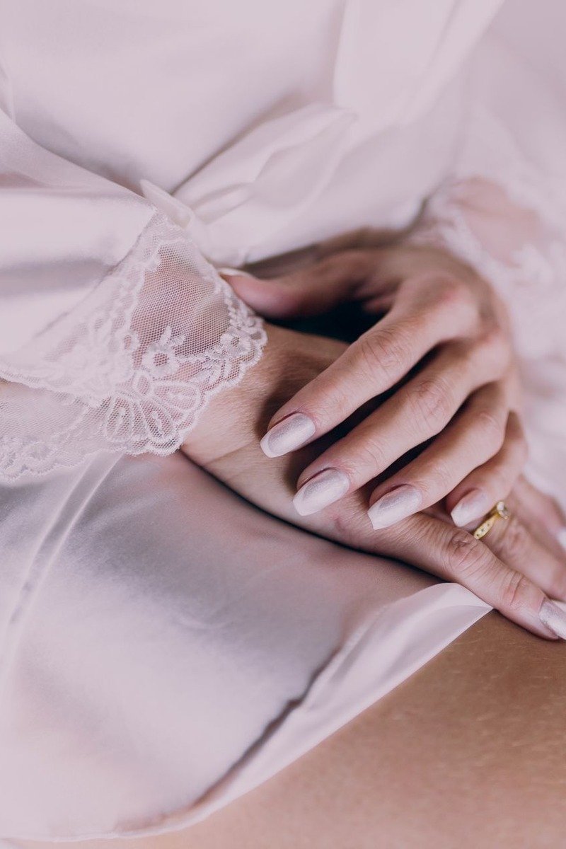 Ivory cream nails with tone-on-tone lace detailing