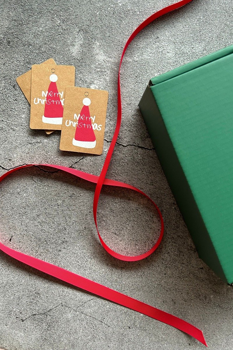 Christmas gift tags with red ribbon