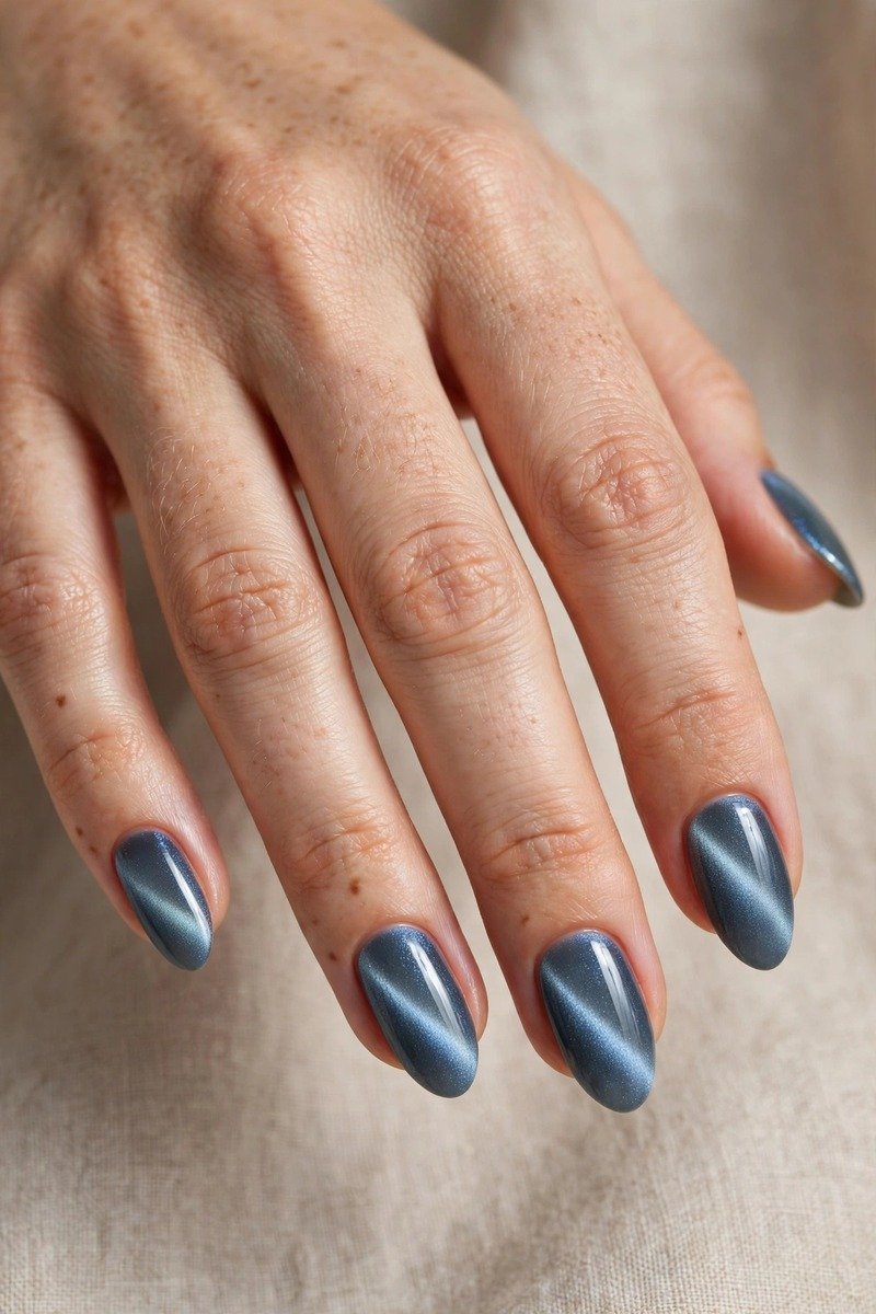 Cat eye magnetic january nails in blue grey