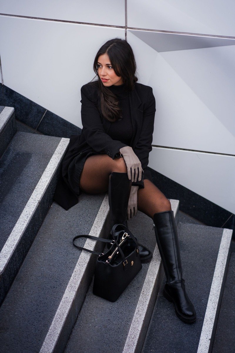 Monochrome black outfit with knee high boots