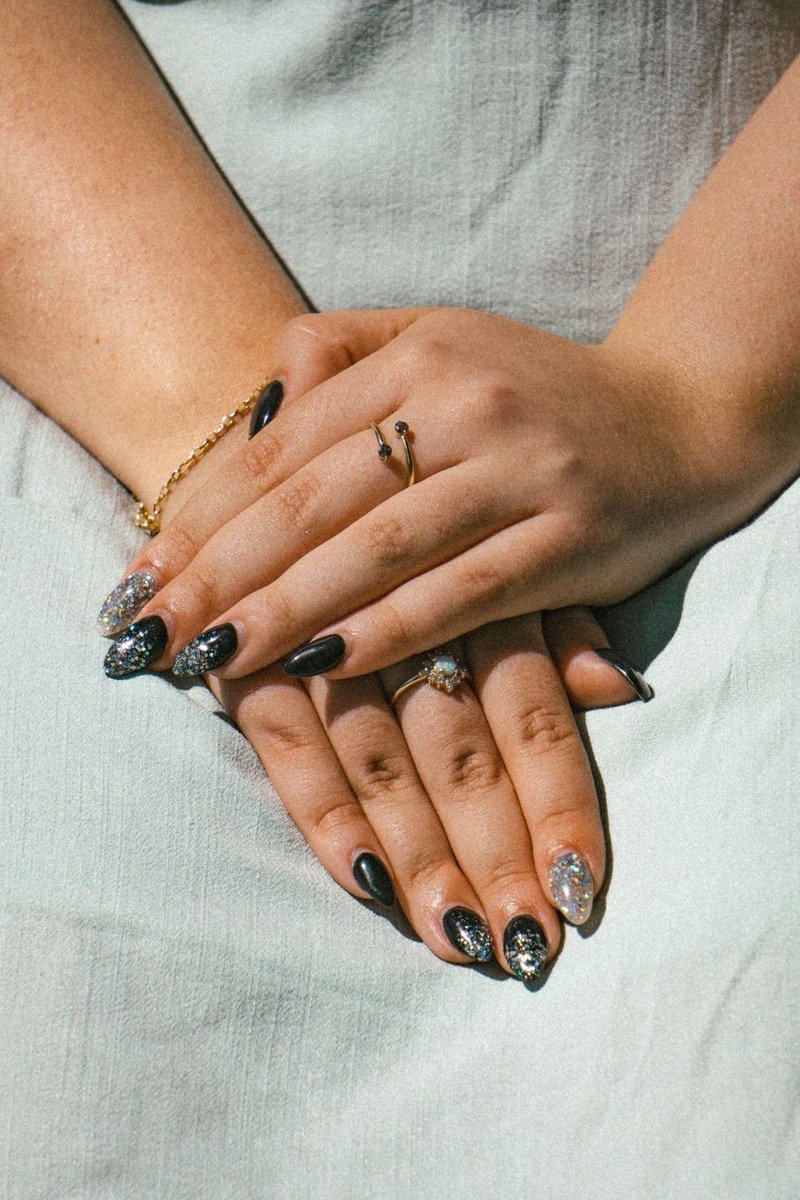 Lace patterned nails with fine glitter accents