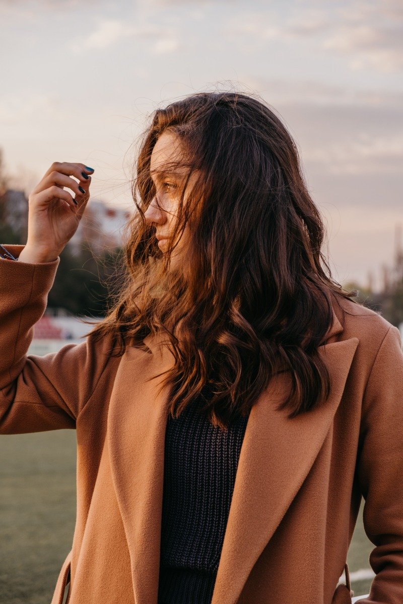 Cinnamon brown winter hair color with warm light
