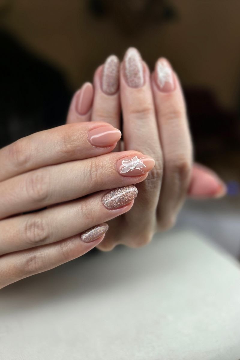 Nails covered in large round sequin-like glitter pieces