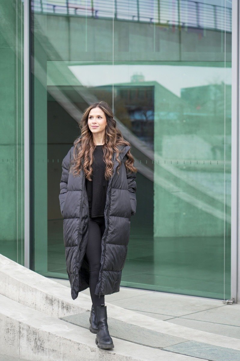 Long puffer coat worn for the office commute