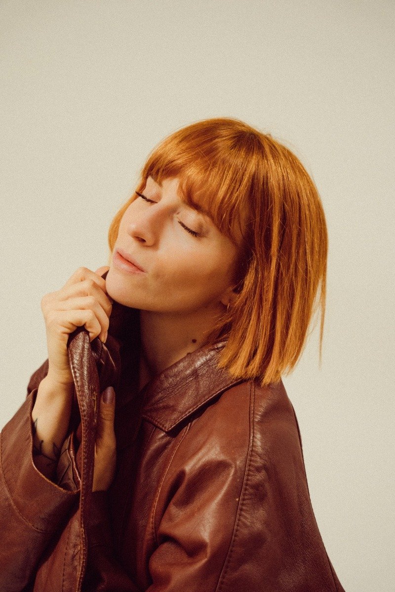 Copper-kissed cherry cola hair color