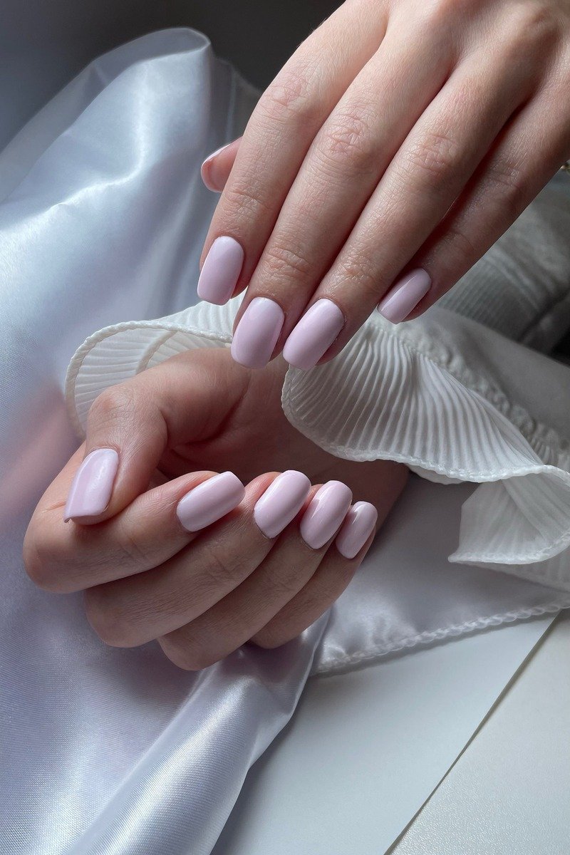Soft almond shaped nails with pink polish