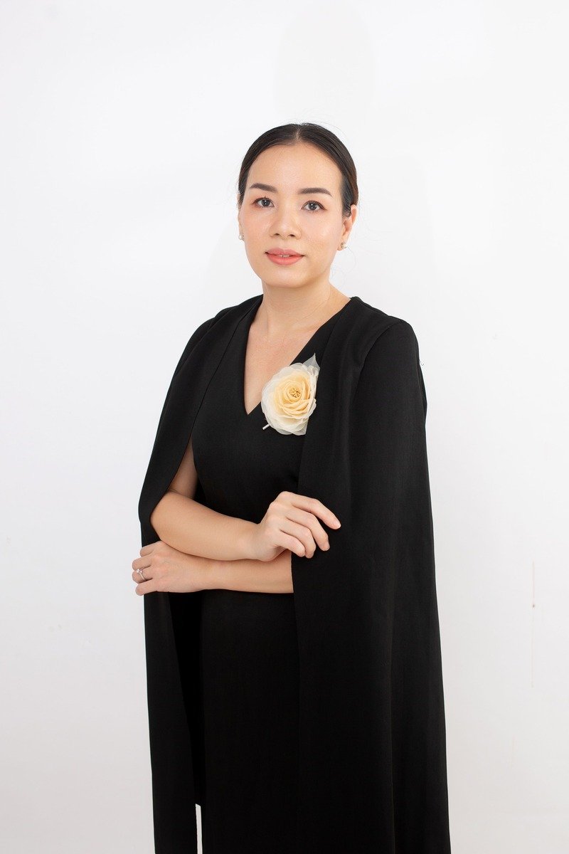 Woman in a cape over an evening dress