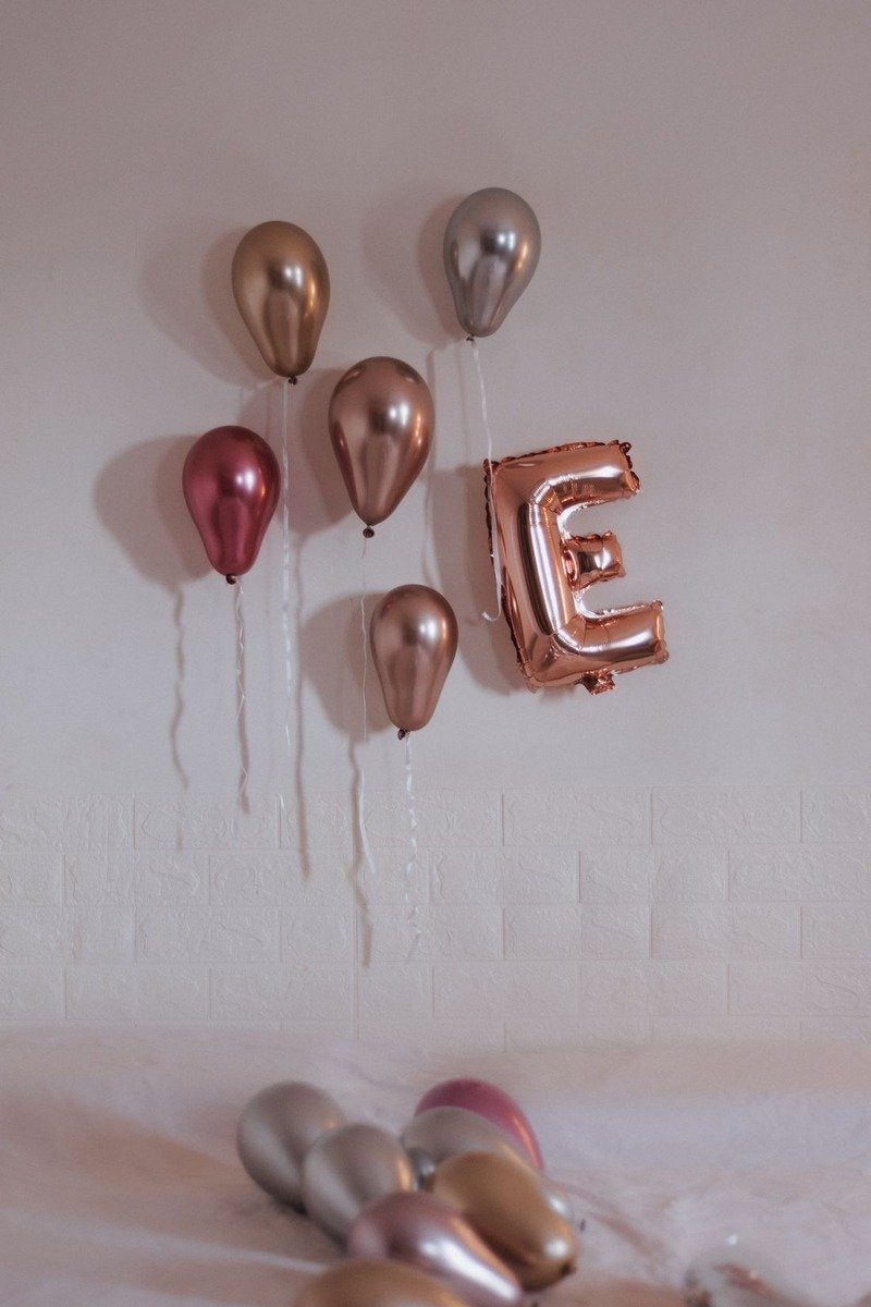 Balloons floating at different heights as a photo backdrop