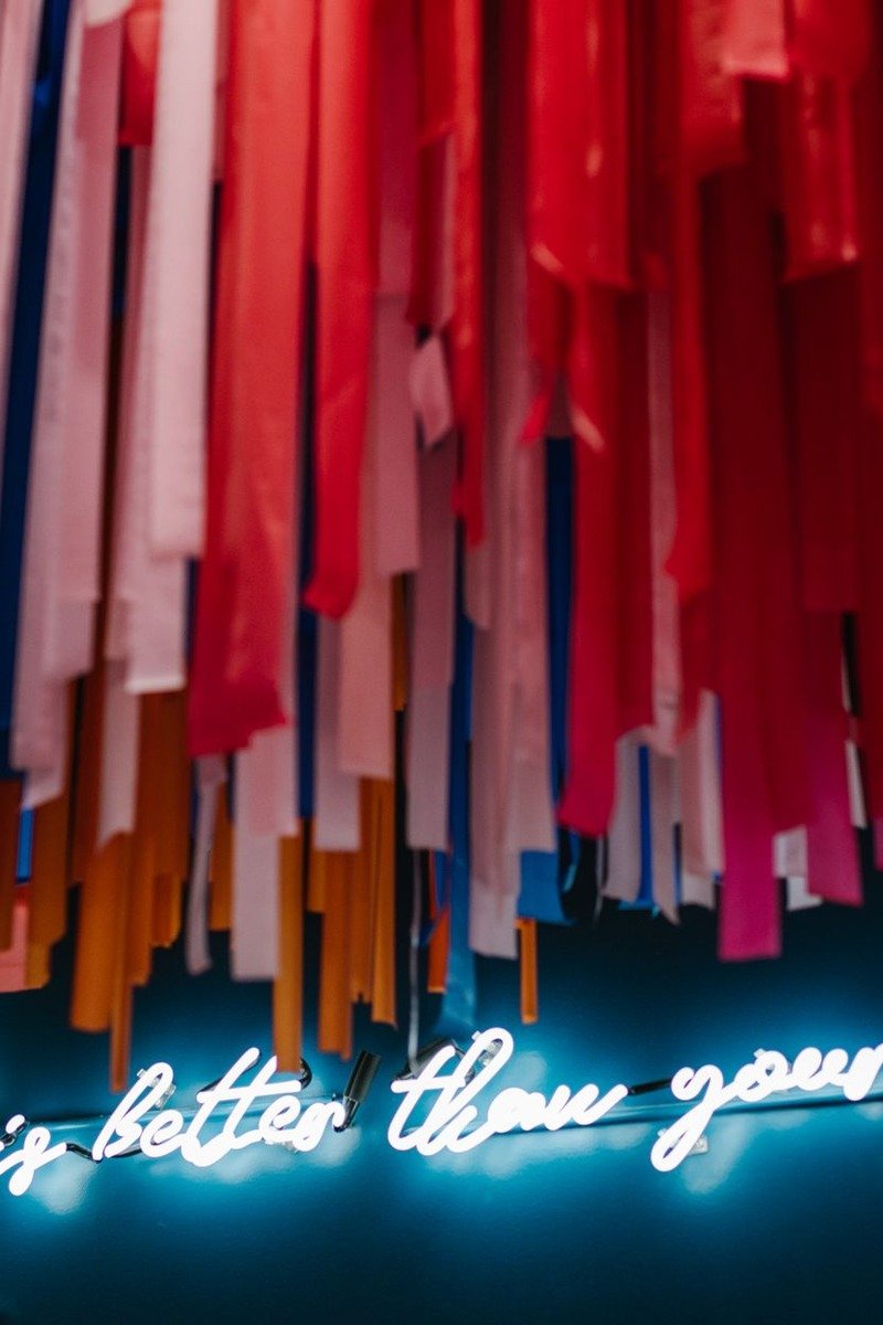 Crepe paper streamers draped across a party ceiling